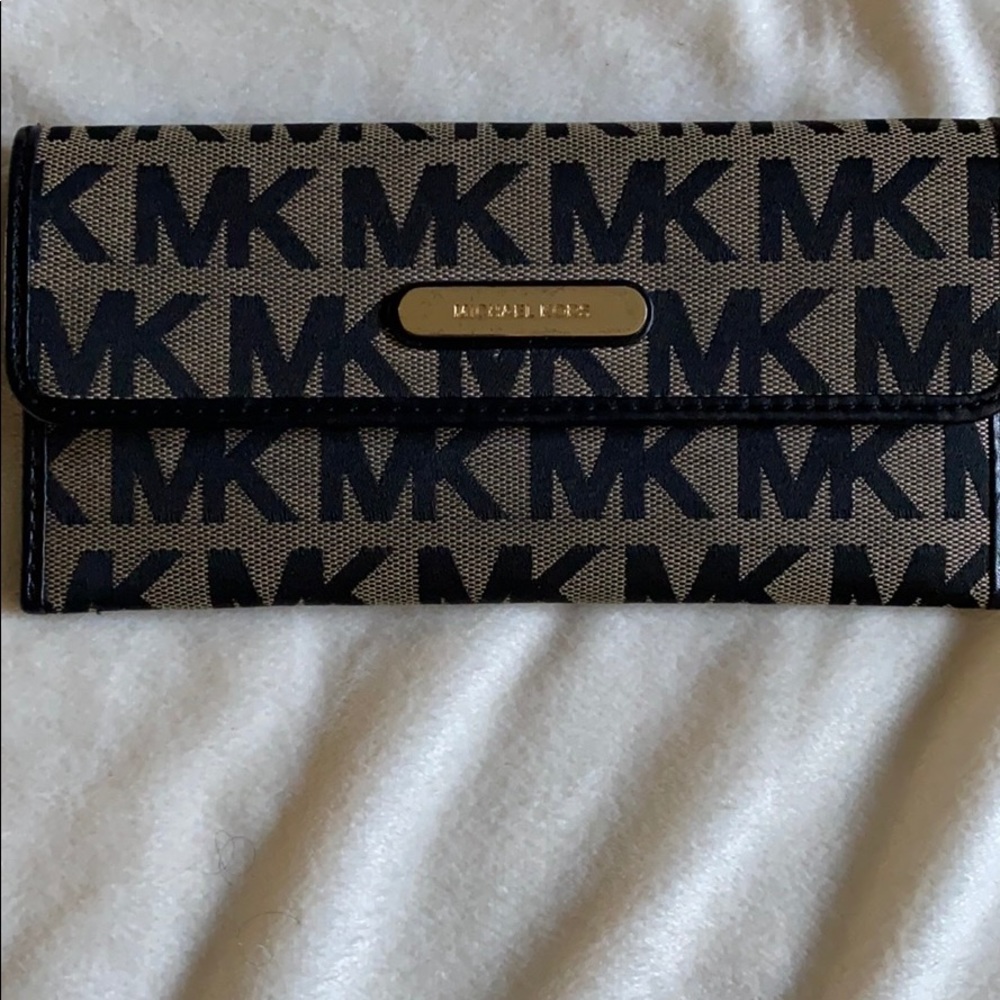 MK wallet monograph